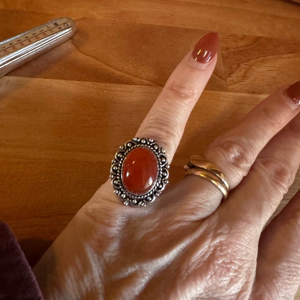 Elegant Silver and Red Gemstone Ring